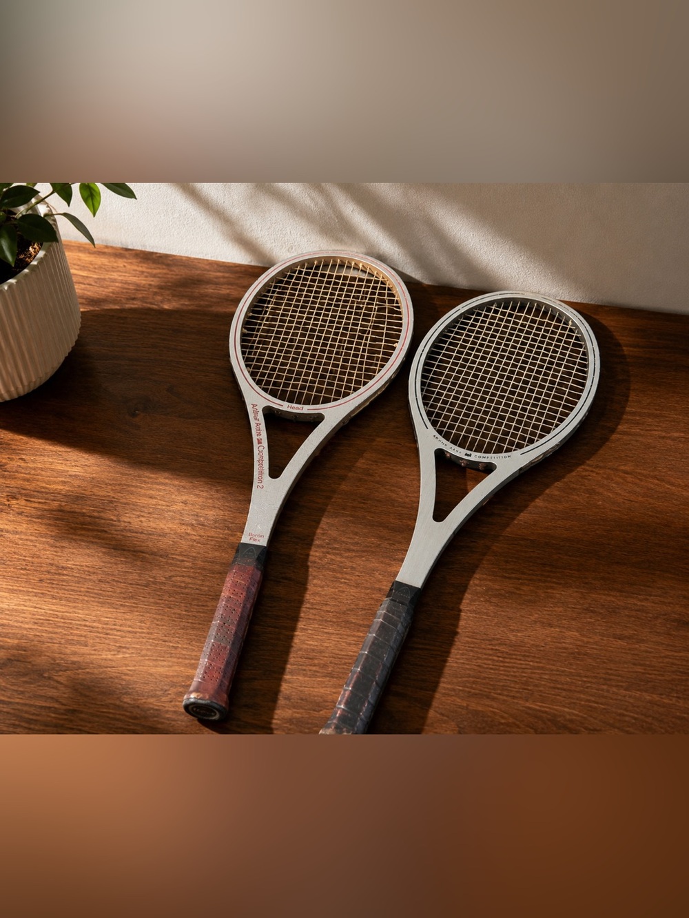 Vintage Head Tennis Racket Pair with Black and Silver Accents